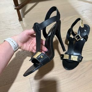 Steve Madden black leather and gold pumps. Size 9 decent used condition. See pic